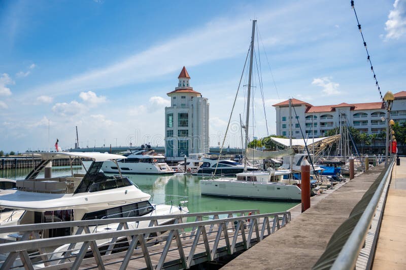 Georgetown, Malaysia - December 18, 2023: Private boat and yacht parking at Strait Quay, Penang. Residential, shopping mall, recreation area and marina located in Tanjung Tokong. High quality photo. Georgetown, Malaysia - December 18, 2023: Private boat and yacht parking at Strait Quay, Penang. Residential, shopping mall, recreation area and marina located in Tanjung Tokong. High quality photo