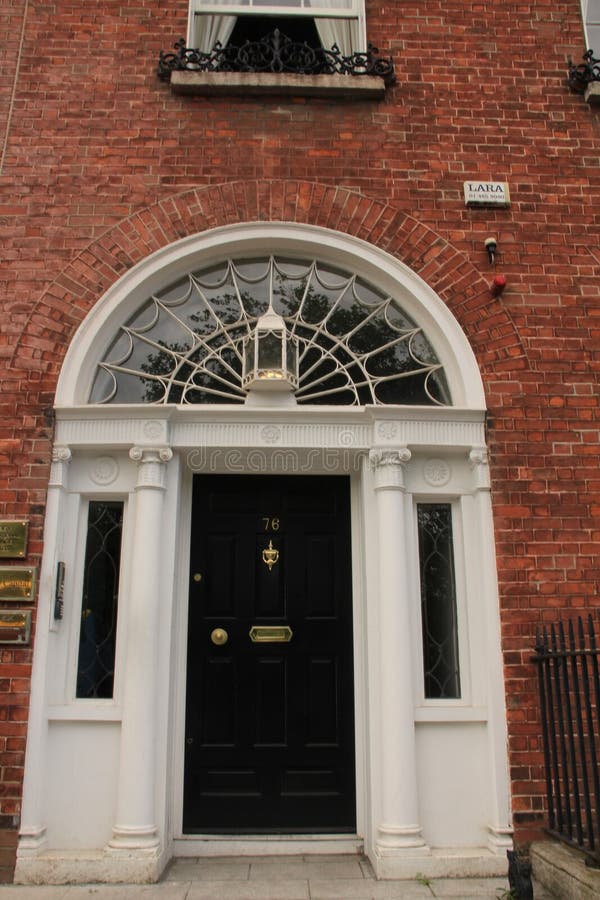 Georgian black door in the city Dublin in Ireland.