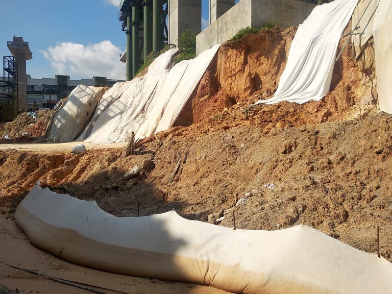 The Geotextile Fabric is Spread Over the Surface of the Slope To