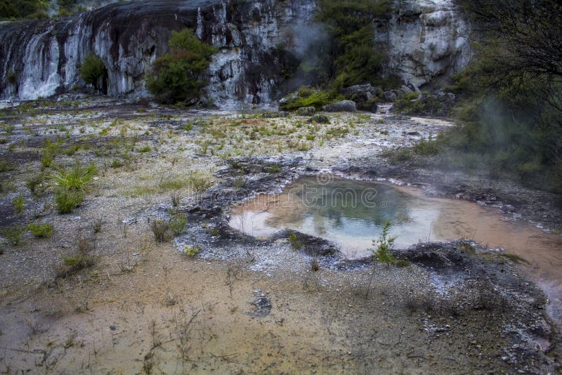 Geothermal hot springs and steam from colorful hot pools stock photo Geothermal hot springs and steam from colorful hot pools stock photo