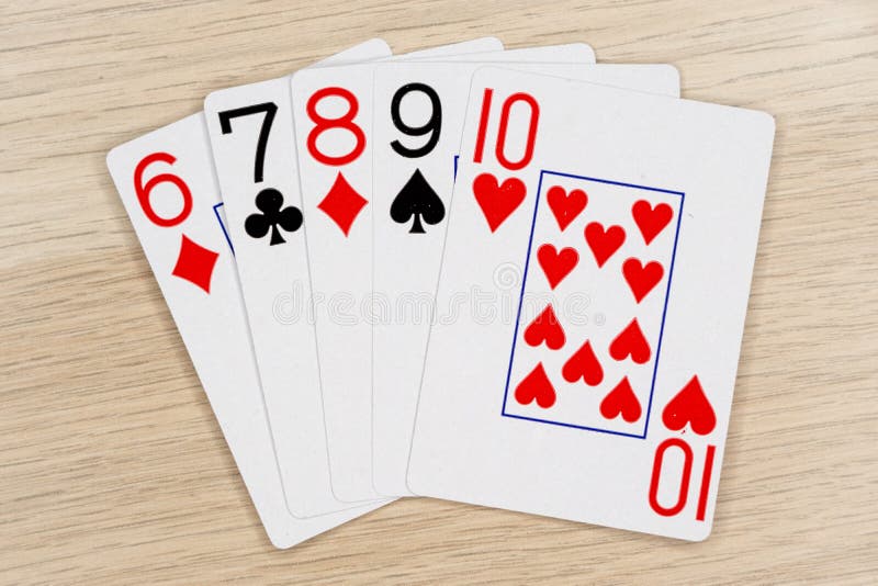 Gerade - Kasino, das Schürhakenkarten spielt lizenzfreie stockbilder Gerade - Kasino, das Schürhakenkarten spielt lizenzfreie stockbilder