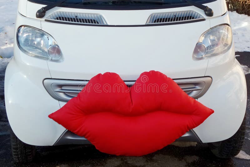 Car for just married, decorated with a big mouth red. Car for just married, decorated with a big mouth red.