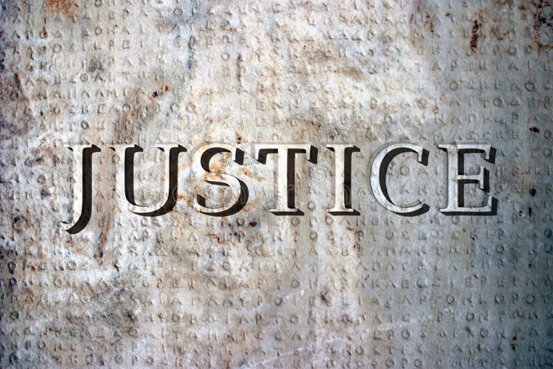 The word justice on a marble plaque with ancient greek inscriptions. The word justice on a marble plaque with ancient greek inscriptions.