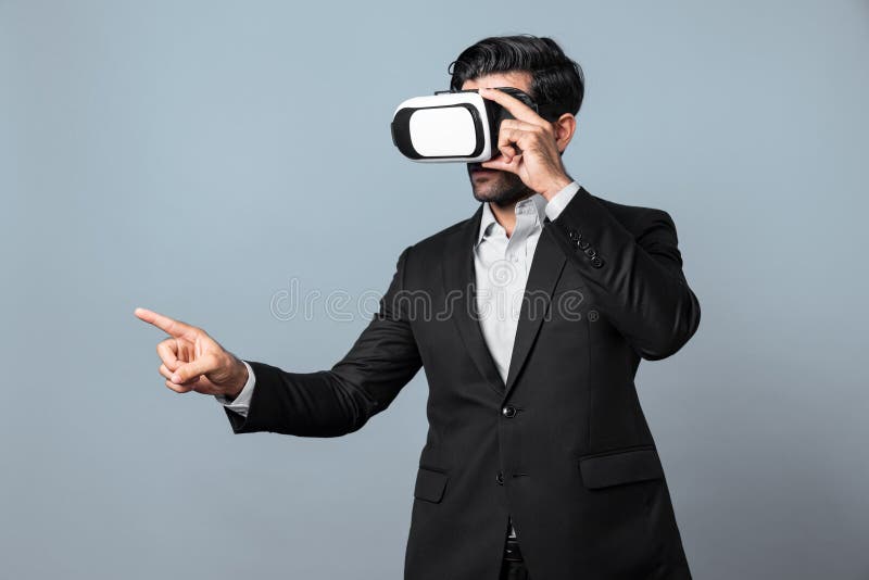 Project manager with virtual reality glasses looking at data analysis while analyzing and pointing data. Skilled business man using VR goggle and digital innovation while enter metaverse. Deviation. Project manager with virtual reality glasses looking at data analysis while analyzing and pointing data. Skilled business man using VR goggle and digital innovation while enter metaverse. Deviation.