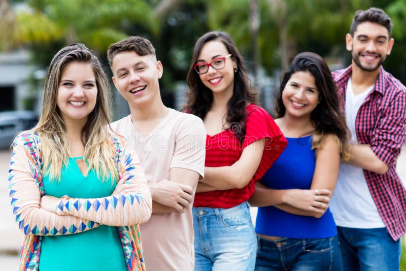 German girl with male and female young adults in line royalty free stock photos German girl with male and female young adults in line royalty free stock photos
