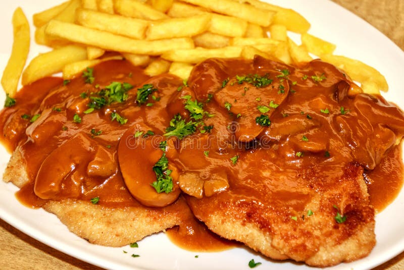 German Jaeger Schnitzel with French Fries Stock Photo Image of hearty