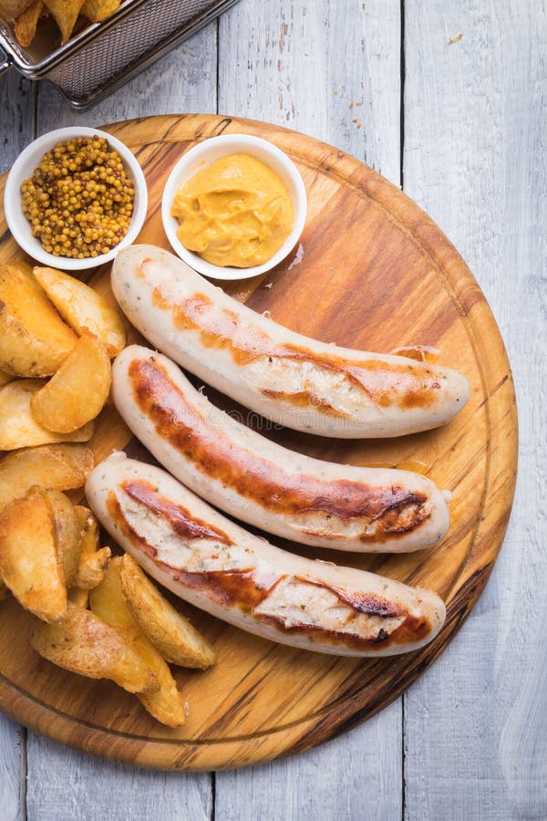 German Sausages with Mostard and Fried Potato Stock Photo Image of