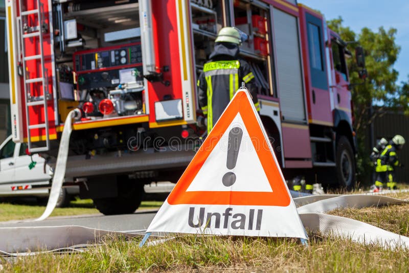 German Unfall Accident Sign Near a Fire Truck Stock Image - Image of ...