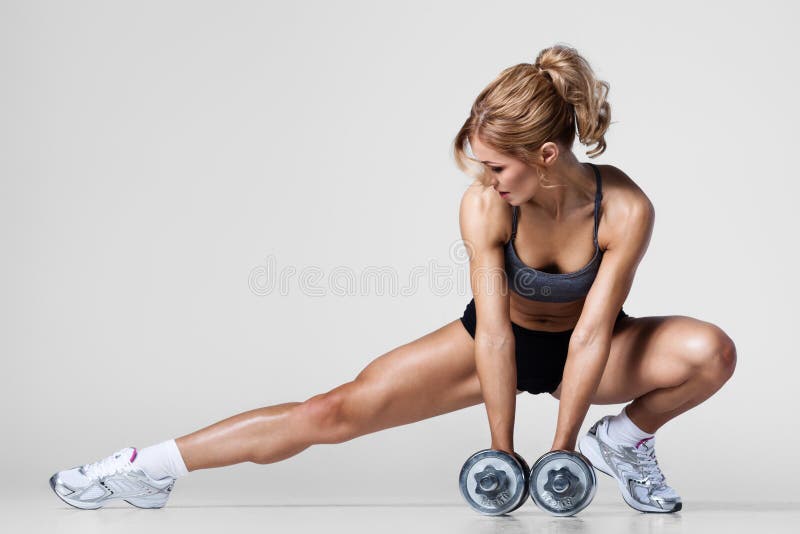 Fitness met dumbbells stock foto's