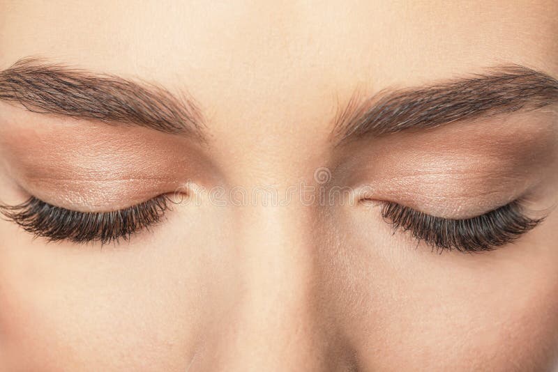 Geschlossene weibliche Augen mit den langen Wimpern, lizenzfreie stockfotografie Geschlossene weibliche Augen mit den langen Wimpern, lizenzfreie stockfotografie