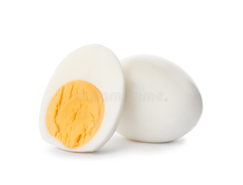 Geschnittene und ganze hart gesotten Eier stockbild