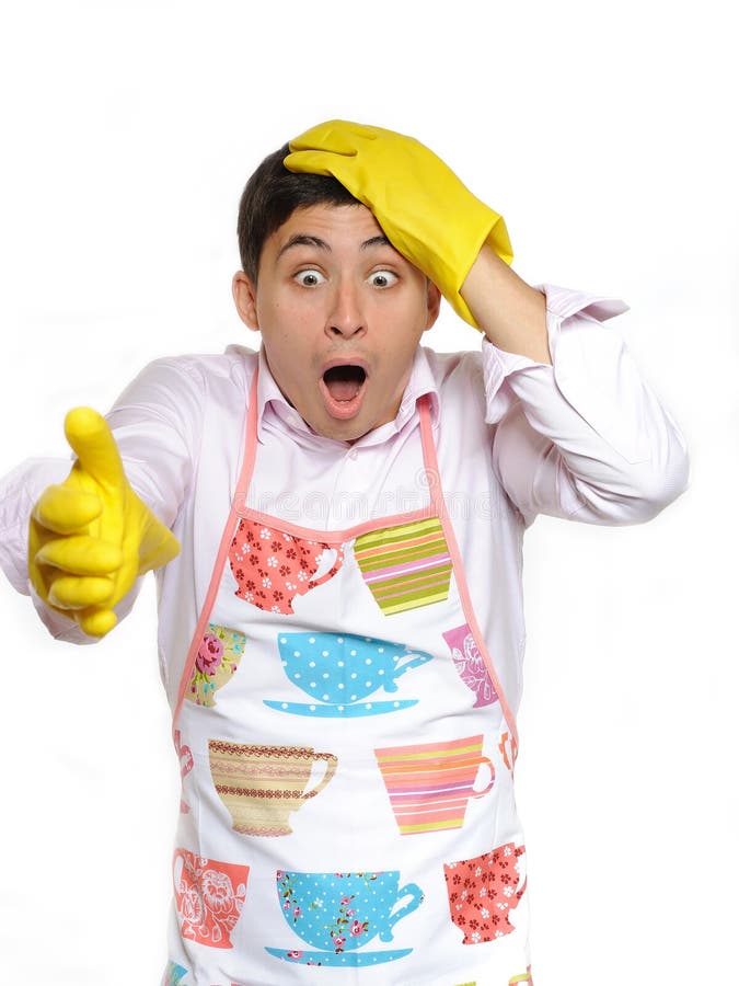 Expressions.shocked house man in apron and yellow glove for washing dishes. Expressions.shocked house man in apron and yellow glove for washing dishes