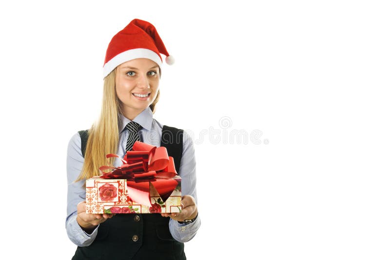 Geschäftsfrau, die einer Sankt den Hut mit einem Geschenk trägt lizenzfreies stockfoto Geschäftsfrau, die einer Sankt den Hut mit einem Geschenk trägt lizenzfreies stockfoto