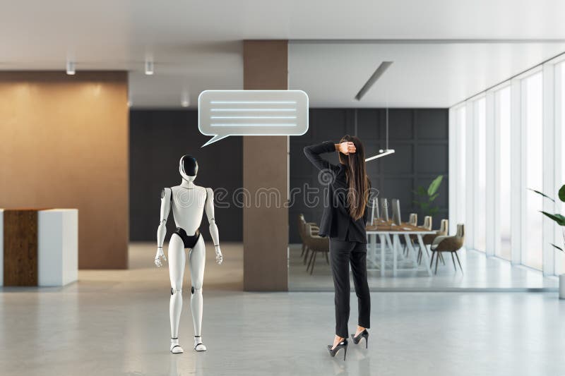 Geschäftsfrau interagiert mit humanoiden Robotern im modernen Bürobereich stockbilder