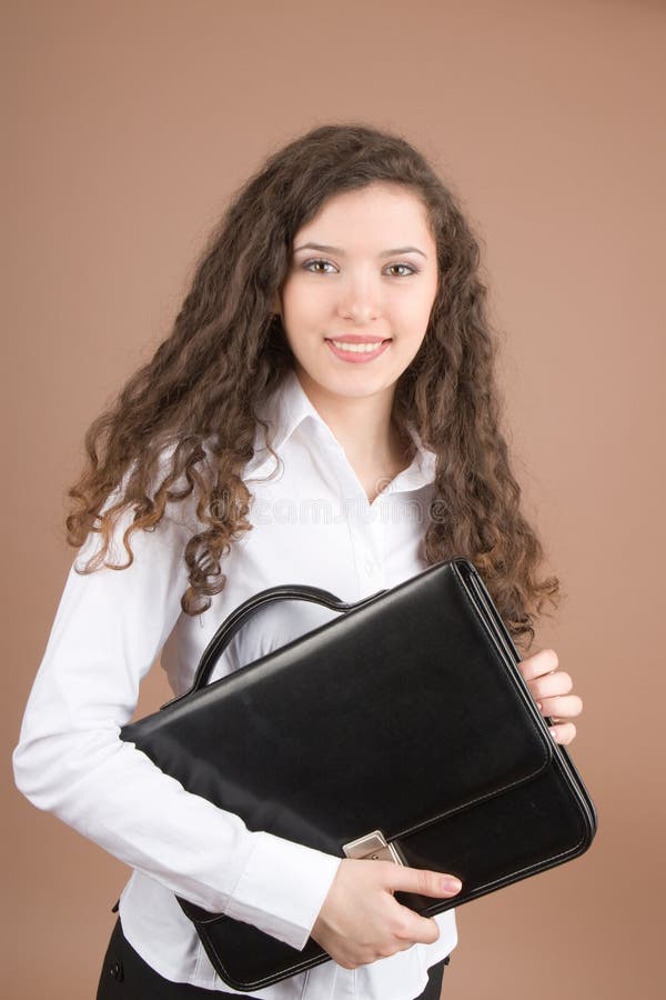 Geschäftsfrau mit Aktenkoffer lizenzfreies stockbild Geschäftsfrau mit Aktenkoffer lizenzfreies stockbild