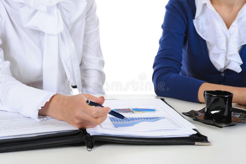Geschäftsfrauen behandeln die Arbeit lizenzfreie stockbilder Geschäftsfrauen behandeln die Arbeit lizenzfreie stockbilder