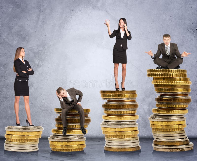 Geschäftsleute auf Münzen stockfoto