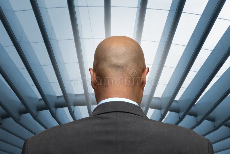 Bald businessman back, with modern roof background. Bald businessman back, with modern roof background