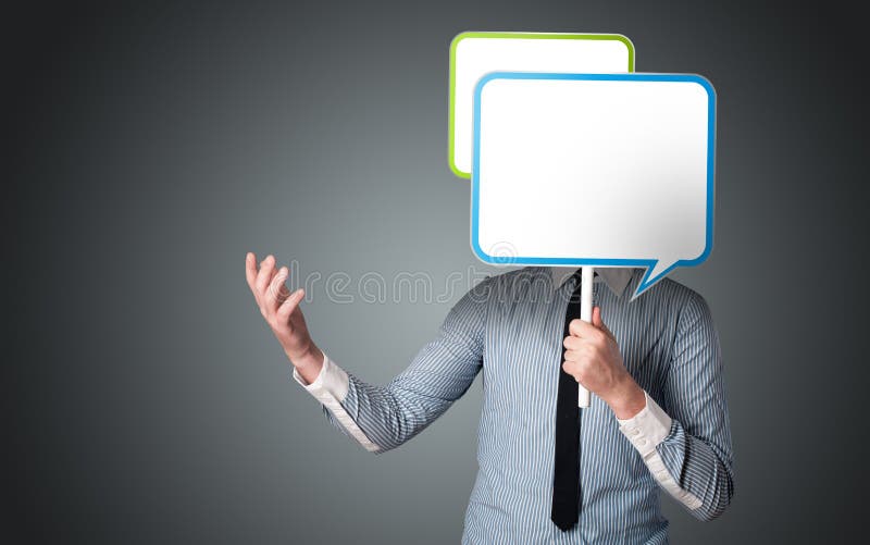 Geschäftsmann, der Spracheblase hält stockfotos Geschäftsmann, der Spracheblase hält stockfotos