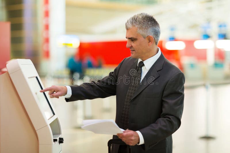 Geschäftsreisendflughafen stockfotografie Geschäftsreisendflughafen stockfotografie