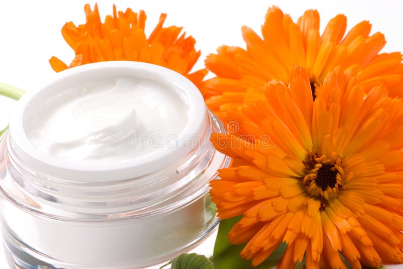 Gesichtssahne und Calendulablume lizenzfreies stockfoto Gesichtssahne und Calendulablume lizenzfreies stockfoto