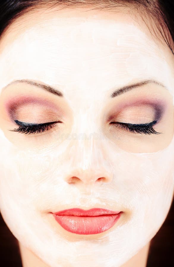 Portrait of a woman with spa mask on her face. Healthcare, medicine. Portrait of a woman with spa mask on her face. Healthcare, medicine.