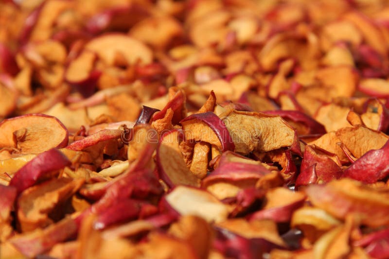 Gesneden droge appelen drying Droge appelachtergrond stock afbeeldingen Gesneden droge appelen drying Droge appelachtergrond stock afbeeldingen