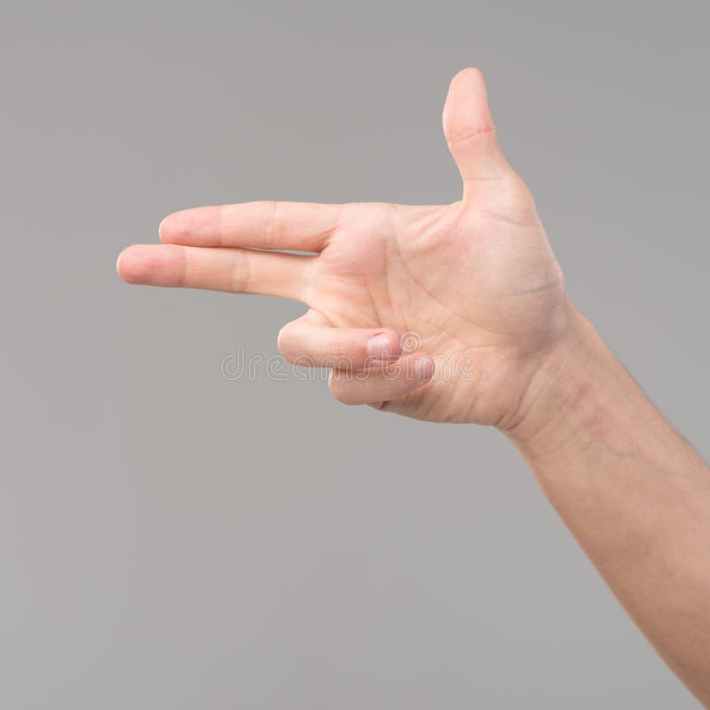Gest för pistol för fingerteckenhand arkivfoto Gest för pistol för fingerteckenhand arkivfoto
