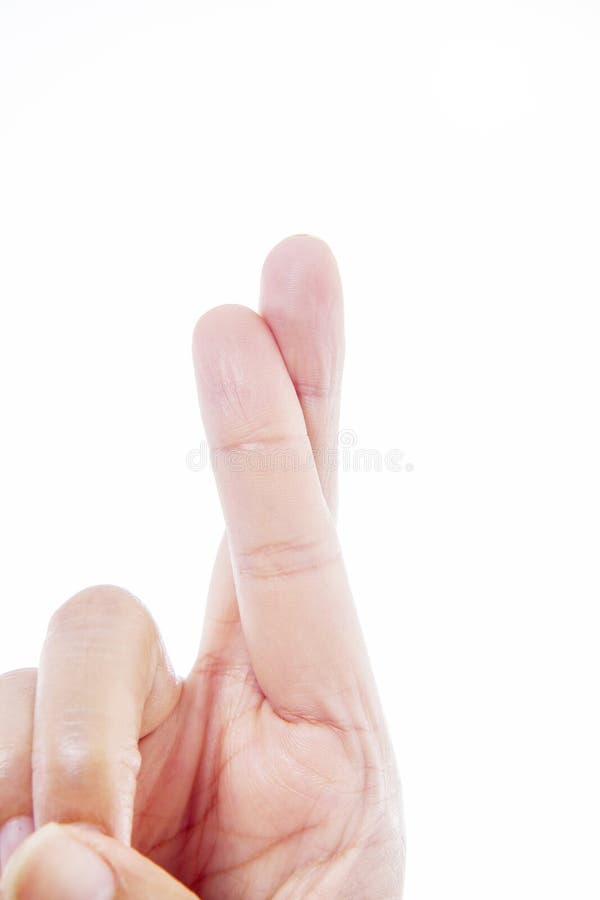 Cross finger gesture on white background. Cross finger gesture on white background