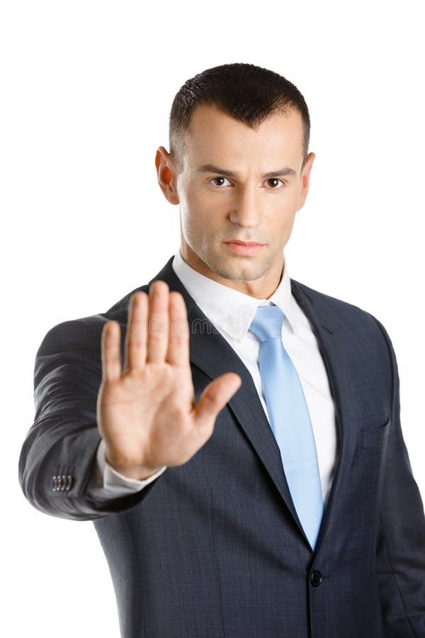 Gesto da parada das mostras do homem de negócios imagem de stock Gesto da parada das mostras do homem de negócios imagem de stock