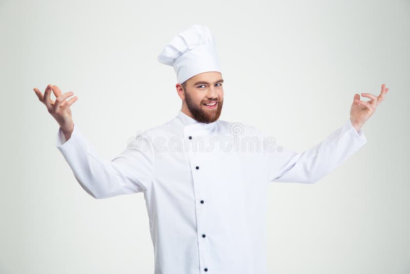 Gesto feliz de la recepción de la demostración del cocinero del cocinero fotografía de archivo libre de regalías Gesto feliz de la recepción de la demostración del cocinero del cocinero fotografía de archivo libre de regalías