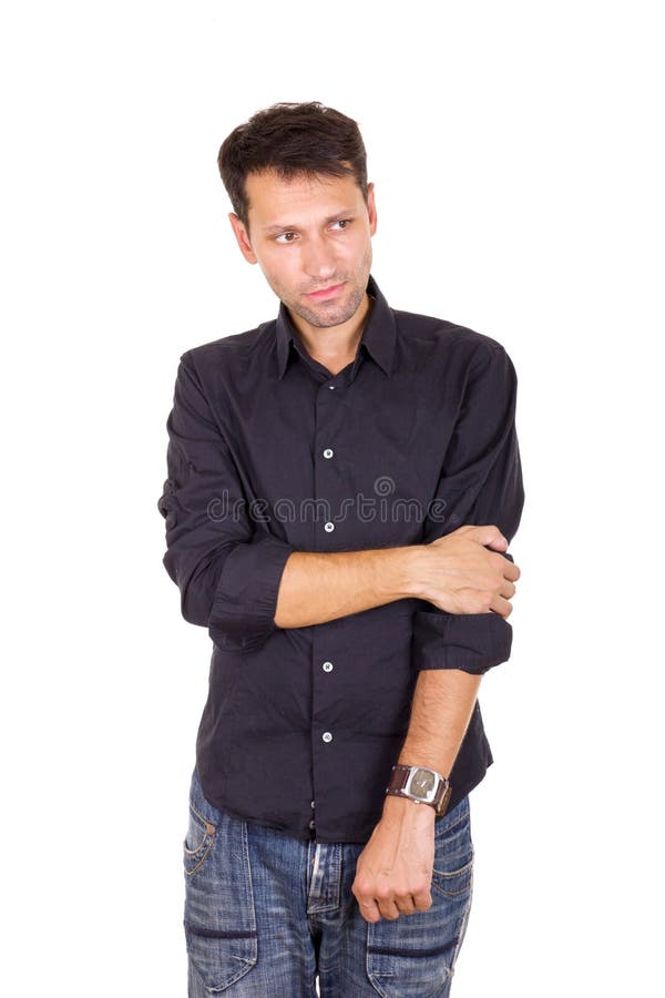 Gestörter trauriger Mann, der mit der Hand auf Ellbogen einsam steht stockbilder Gestörter trauriger Mann, der mit der Hand auf Ellbogen einsam steht stockbilder