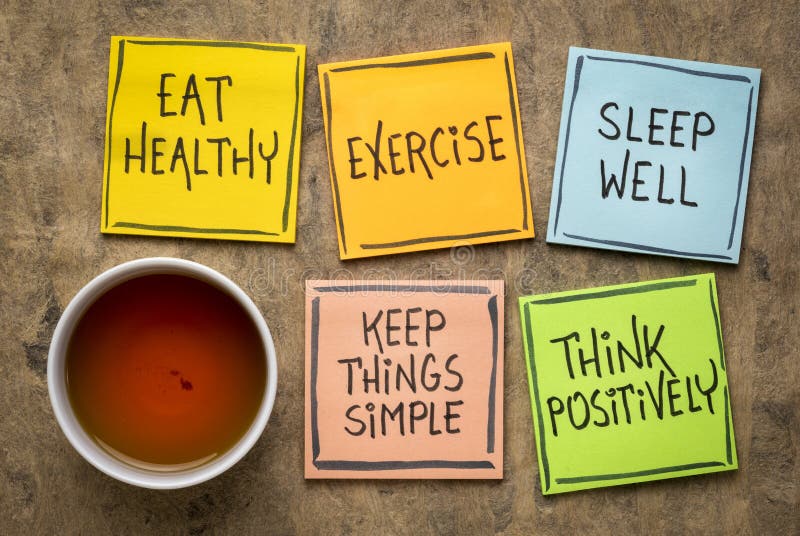 Healthy lifestyle and wellbeing concept - a set of inspirational reminder notes with a cup of tea: eat healthy, exercise, seep well, keep things simple, think positively. Healthy lifestyle and wellbeing concept - a set of inspirational reminder notes with a cup of tea: eat healthy, exercise, seep well, keep things simple, think positively