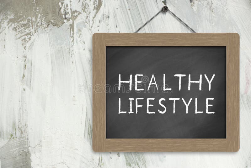 Healthy lifestyle sign blackboard hanging on the wall. Healthy lifestyle sign blackboard hanging on the wall.