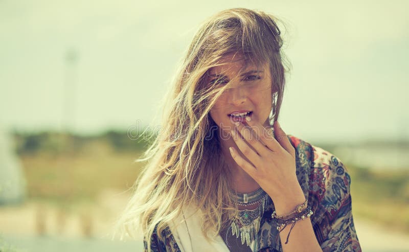 Get lost, you might just find yourself. a fashionable young woman posing outside on a sunny day. stock photos