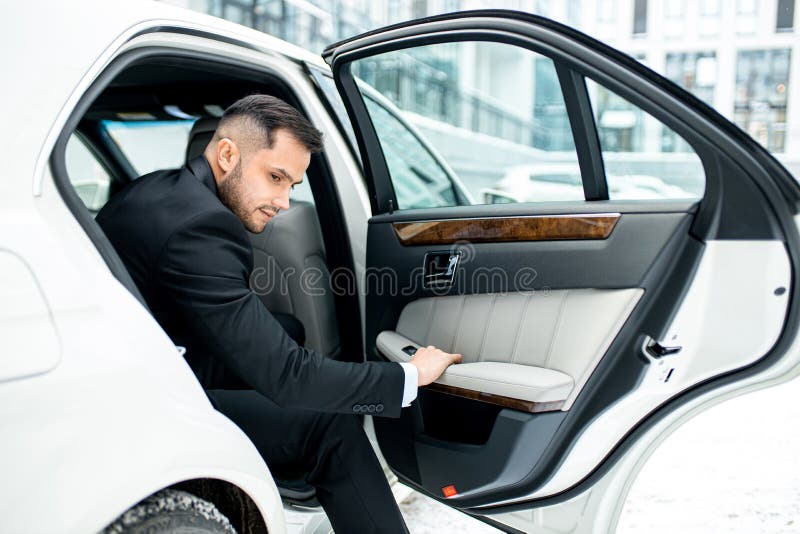 Get Out From Car Side View On Man Getting Out From His White Auto Stock Image Image Of 