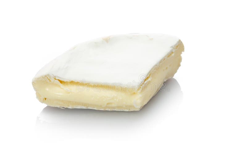 Getcamembertost som är krämig på vitt arkivbild Getcamembertost som är krämig på vitt arkivbild