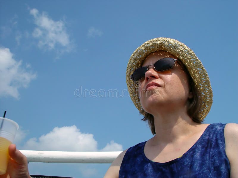 Having a drink while coursing on a boat in Florida. Having a drink while coursing on a boat in Florida