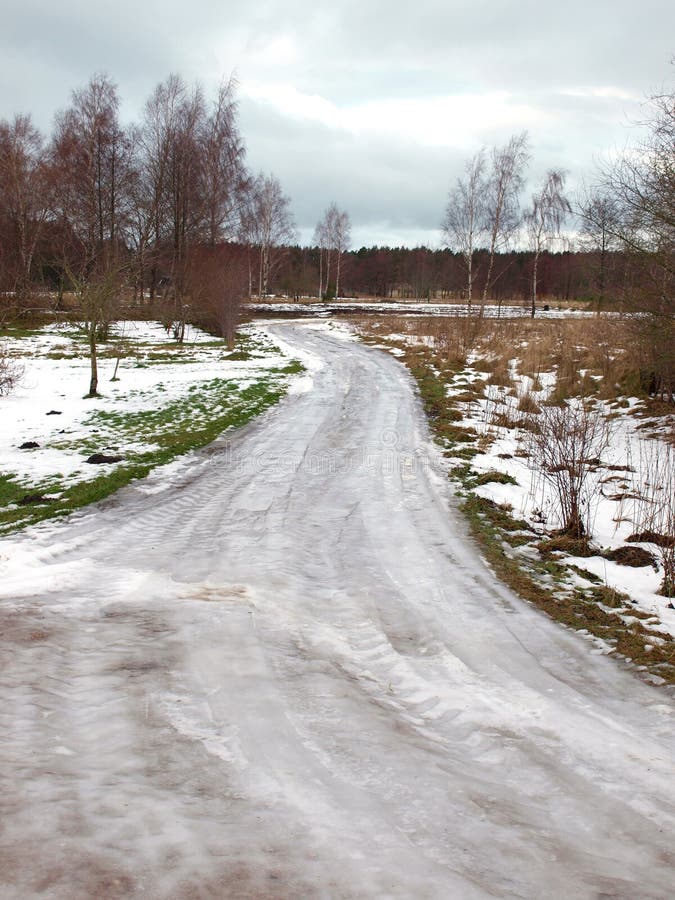 The country road, covered with wet ice. The country road, covered with wet ice