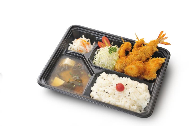 Geïsoleerd en het knippen weg van zeevruchten gefrituurde reeks in bentodoos stock afbeelding Geïsoleerd en het knippen weg van zeevruchten gefrituurde reeks in bentodoos stock afbeelding