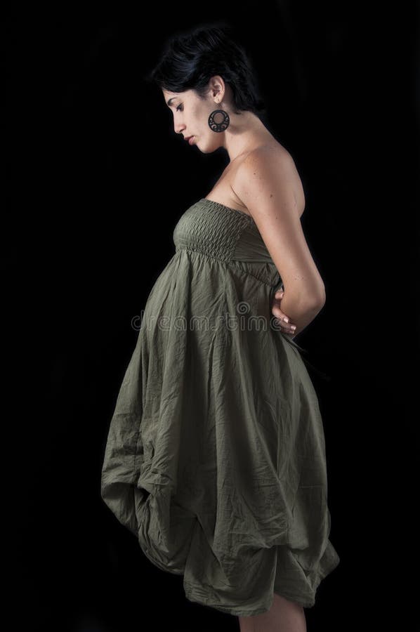 Geïsoleerdi portret van zwangere vrouw royalty-vrije stock fotografie Geïsoleerdi portret van zwangere vrouw royalty-vrije stock fotografie