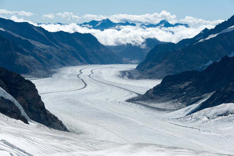 The world-heritage Aletsch Glacier, as viewed from Jungfraujoch in the Swiss Alps. The world-heritage Aletsch Glacier, as viewed from Jungfraujoch in the Swiss Alps.