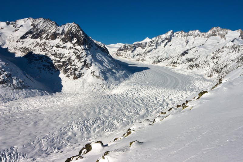 Winter in the Swiss Alps. View over the Aletsch Glacier from Hohfluh, Bettmeralp, Brig Wallis-Valais Switzerland. Winter in the Swiss Alps. View over the Aletsch Glacier from Hohfluh, Bettmeralp, Brig Wallis-Valais Switzerland