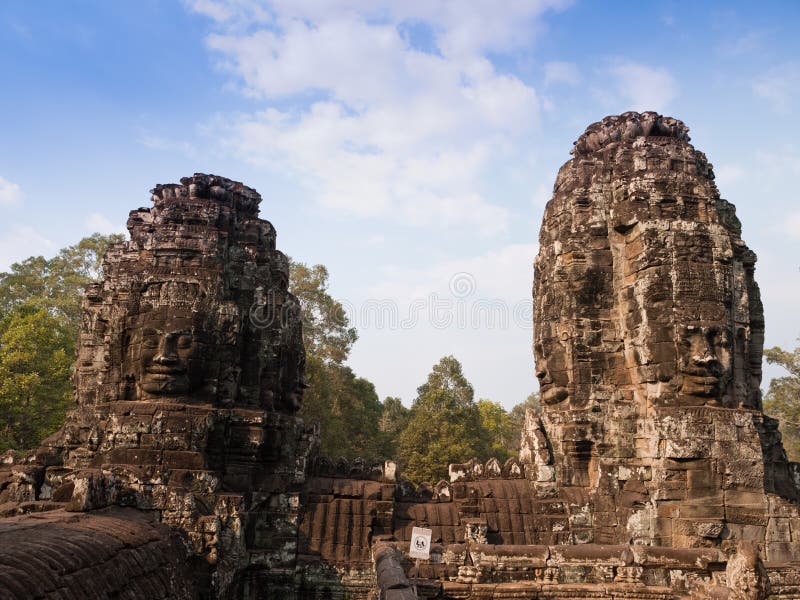 Giant buddha face at Bayon Temple, Cambodia.