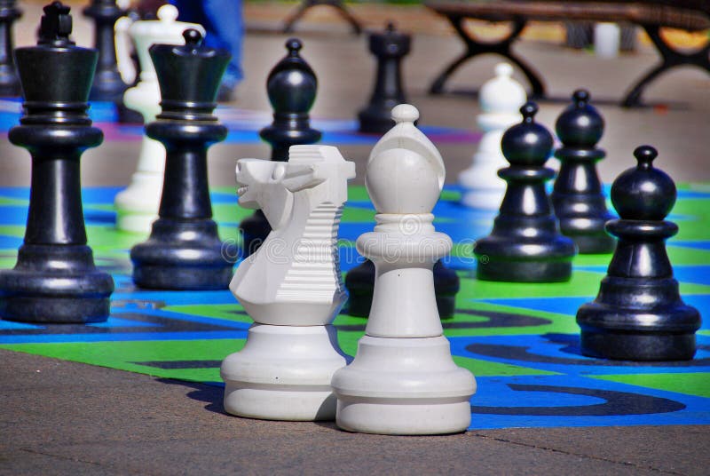 Children playing chess game on street with large size chess pieces and chess  board on street of Mile End in Le Plateau Mont Royal.Montreal.Quebec.Canada  Stock Photo - Alamy