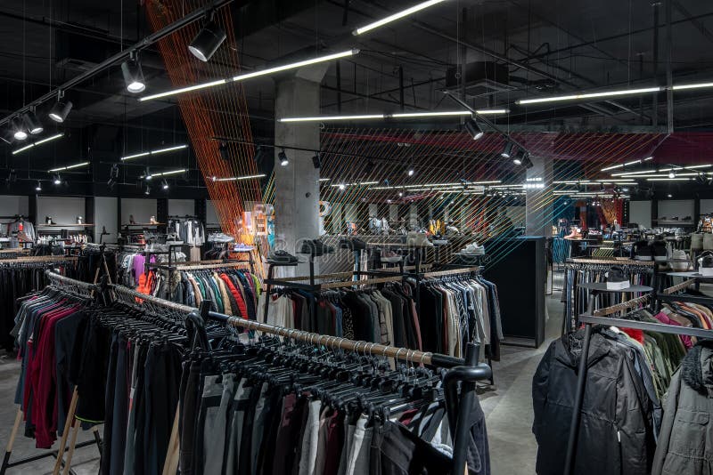 Modern Clothes Shop with Large Selection of Different Wear and Shoes ...