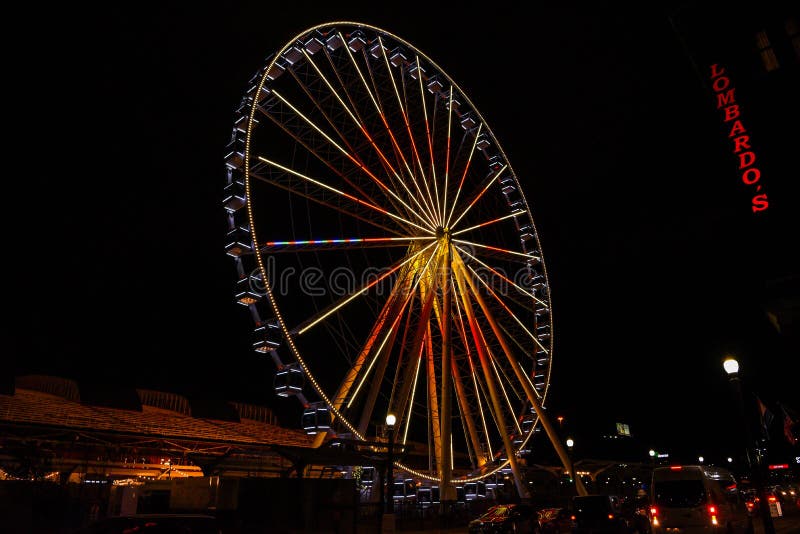 Giant Ferris Wheel at Union Station St Louis at night. stock images