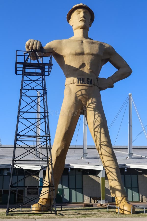 Giant Golden Driller Statue and landmark of oilfield worker and oil derrick near Route 66 in Tulsa Oklahoma royalty free stock image Giant Golden Driller Statue and landmark of oilfield worker and oil derrick near Route 66 in Tulsa Oklahoma royalty free stock image