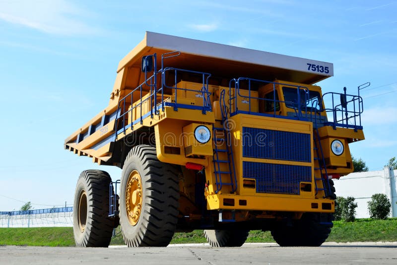 Giant mining dump truck, after being discharged from the conveyor, is tested at the factory test site. Heavy-duty truck manufacture by the heavy vehicle plant