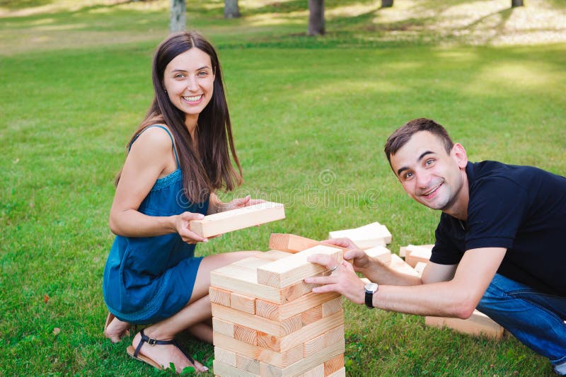 Giant Outdoor Block Game Game on the Green Grass. Stock Image Image